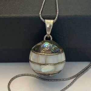 Vintage Sterling Silver Long Necklace with a Large Harmony Bell Pendant.